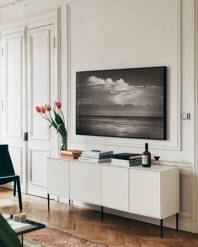 Straight of Juan de Fuca by Alan Majchrowicz. shown as a framed stretched canvas in a living room above a console. Available as a archival giclee rolled canvas, fine art paper, or poster print. SKU 64565i.