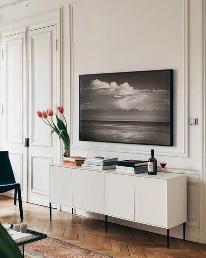 Straight of Juan de Fuca by Alan Majchrowicz. shown as a framed stretched canvas in a living room above a console. Available as a archival giclee rolled canvas, fine art paper, or poster print. SKU 64565i.