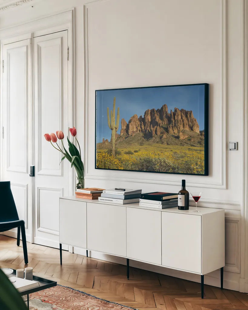 Superstition Mountains Saguaro by Alan Majchrowicz. shown as a framed stretched canvas in a living room above a console. Available as a archival giclee rolled canvas, fine art paper, or poster print. SKU 84039i.