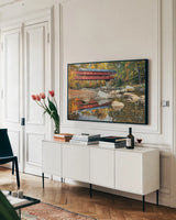 Swift River Covered Bridge by Alan Majchrowicz. shown as a framed stretched canvas in a living room above a console. Available as a archival giclee rolled canvas, fine art paper, or poster print. SKU 17974i.