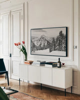 Tatoosh Range BW by Alan Majchrowicz. shown as a framed stretched canvas in a living room above a console. Available as a archival giclee rolled canvas, fine art paper, or poster print. SKU 65706i.