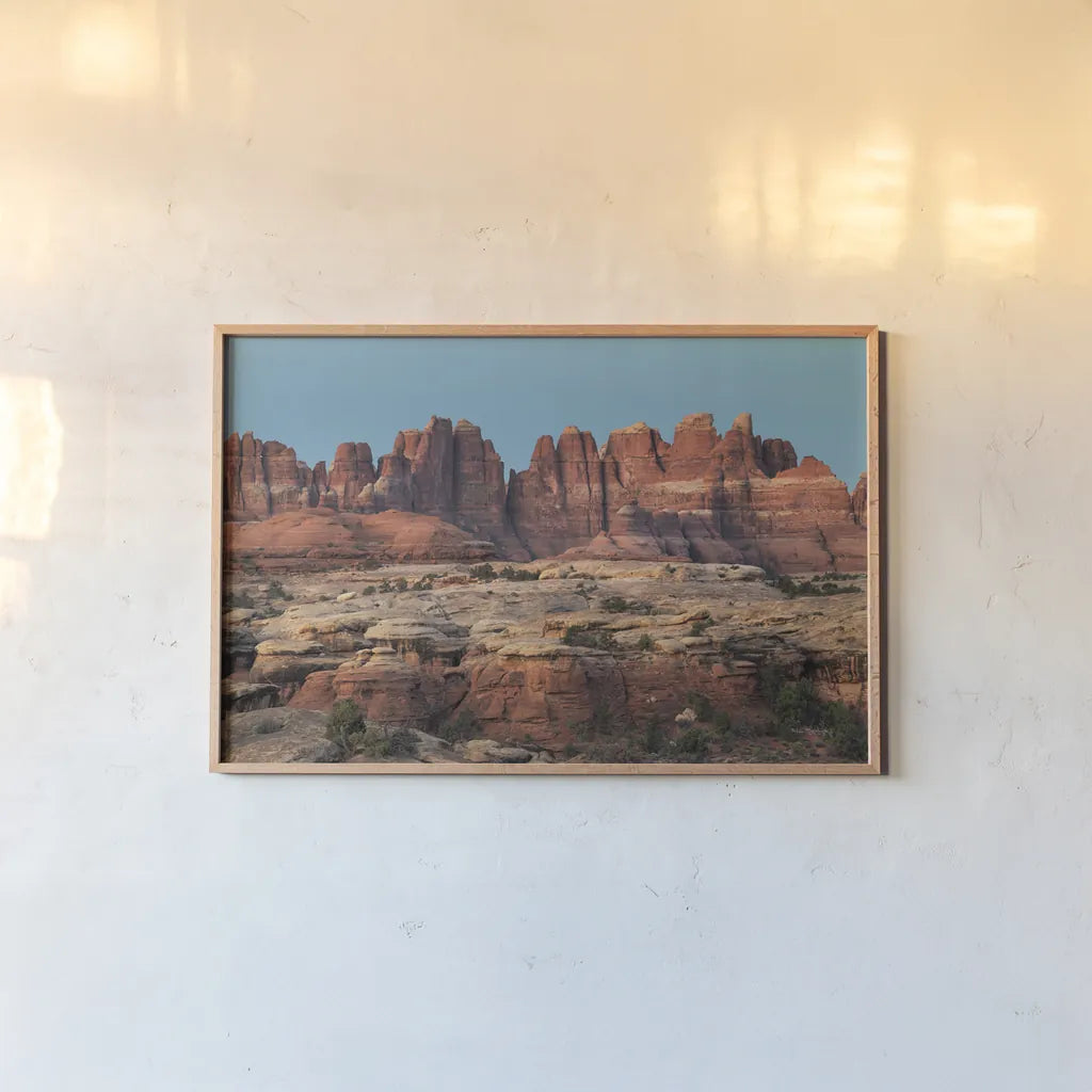 The Needles Canyonlands National Park by Alan Majchrowicz. shown as a paper print in a natural frame. Available as a archival giclee rolled canvas, fine art paper, or poster print. SKU 80814i.
