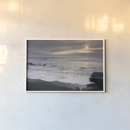 Tides and Waves Sunset II by Alan Majchrowicz. shown as a paper print in a white frame. Available as a archival giclee rolled canvas, fine art paper, or poster print. SKU 7752i.