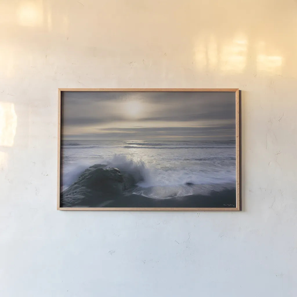 Tides and Waves Sunset III by Alan Majchrowicz. shown as a paper print in a natural frame. Available as a archival giclee rolled canvas, fine art paper, or poster print. SKU 7753i.