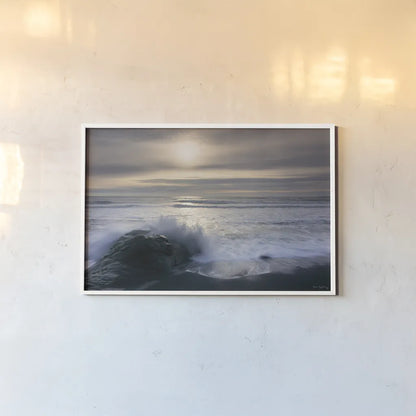 Tides and Waves Sunset III by Alan Majchrowicz. shown as a paper print in a white frame. Available as a archival giclee rolled canvas, fine art paper, or poster print. SKU 7753i.