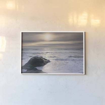 Tides and Waves Sunset V by Alan Majchrowicz. shown as a paper print in a white frame. Available as a archival giclee rolled canvas, fine art paper, or poster print. SKU 7755i.