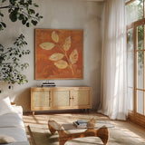 Autumn Leaves I by Albena Hristova. Shown in a natural wood frame in a cozy modern living room. Available as an archival giclee rolled canvas, fine art paper, or poster print. SKU 55450a.