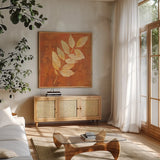 Autumn Leaves IV by Albena Hristova. Shown in a natural wood frame in a cozy modern living room. Available as an archival giclee rolled canvas, fine art paper, or poster print. SKU 55453a.