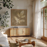 Autumn Leaves White on Taupe II by Albena Hristova. Shown in a natural wood frame in a cozy modern living room. Available as an archival giclee rolled canvas, fine art paper, or poster print. SKU 55459a.