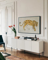 Big Cat I by Albena Hristova. shown as a framed stretched canvas in a living room above a console. Available as a archival giclee rolled canvas, fine art paper, or poster print. SKU 44156i.