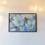 Blue Magnolias by Albena Hristova. shown as a paper print in a black flame. Available as a archival giclee rolled canvas, fine art paper, or poster print. SKU 54828i.