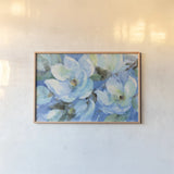 Blue Magnolias by Albena Hristova. shown as a paper print in a natural frame. Available as a archival giclee rolled canvas, fine art paper, or poster print. SKU 54828i.