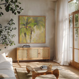 Breezy Palm I by Albena Hristova. Shown in a natural wood frame in a cozy modern living room. Available as an archival giclee rolled canvas, fine art paper, or poster print. SKU 17822a.