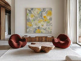 Buttercups I by Albena Hristova. Shown as extra-large giant wall art in a modern living room. Available as an archival giclee rolled canvas, fine art paper, or poster print. SKU 22473a.