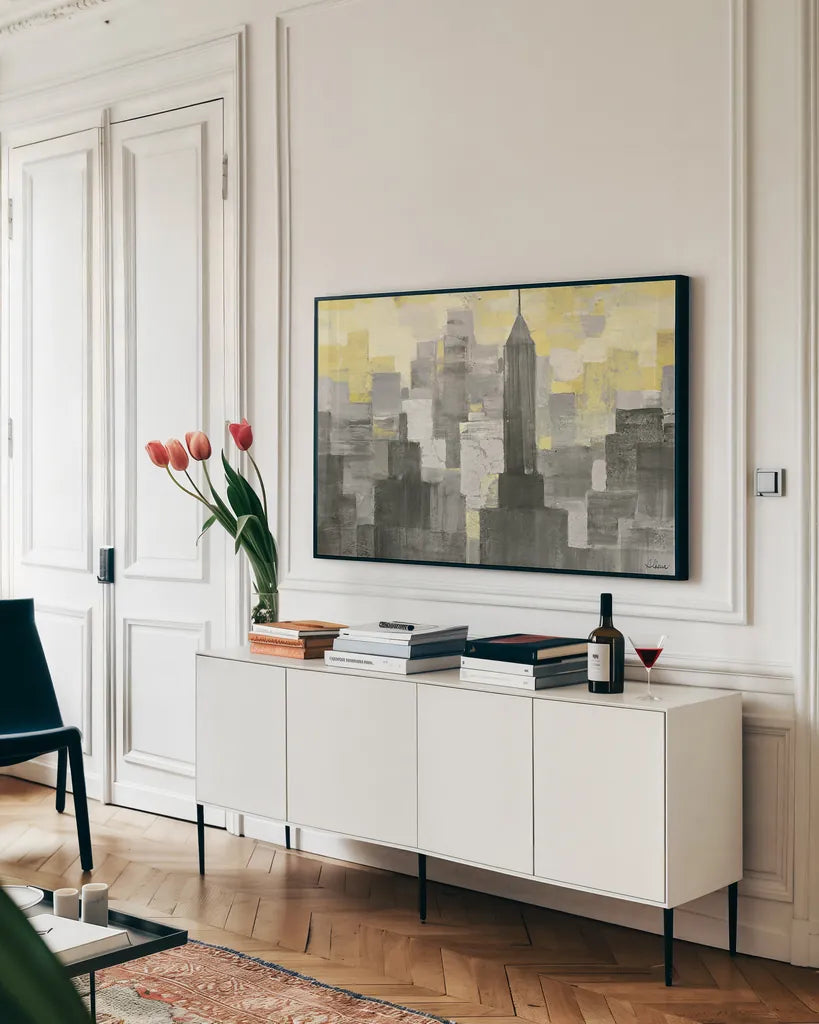 City Blocks Neutral by Albena Hristova. shown as a framed stretched canvas in a living room above a console. Available as a archival giclee rolled canvas, fine art paper, or poster print. SKU 20574i.