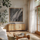 Dark Grey Splash by Albena Hristova. Shown in a natural wood frame in a cozy modern living room. Available as an archival giclee rolled canvas, fine art paper, or poster print. SKU 28023a.
