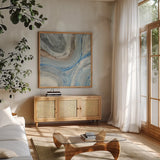 Estuary by Albena Hristova. Shown in a natural wood frame in a cozy modern living room. Available as an archival giclee rolled canvas, fine art paper, or poster print. SKU 46419a.