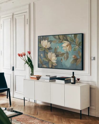 Floating Magnolia by Albena Hristova. shown as a framed stretched canvas in a living room above a console. Available as a archival giclee rolled canvas, fine art paper, or poster print. SKU 5071i.