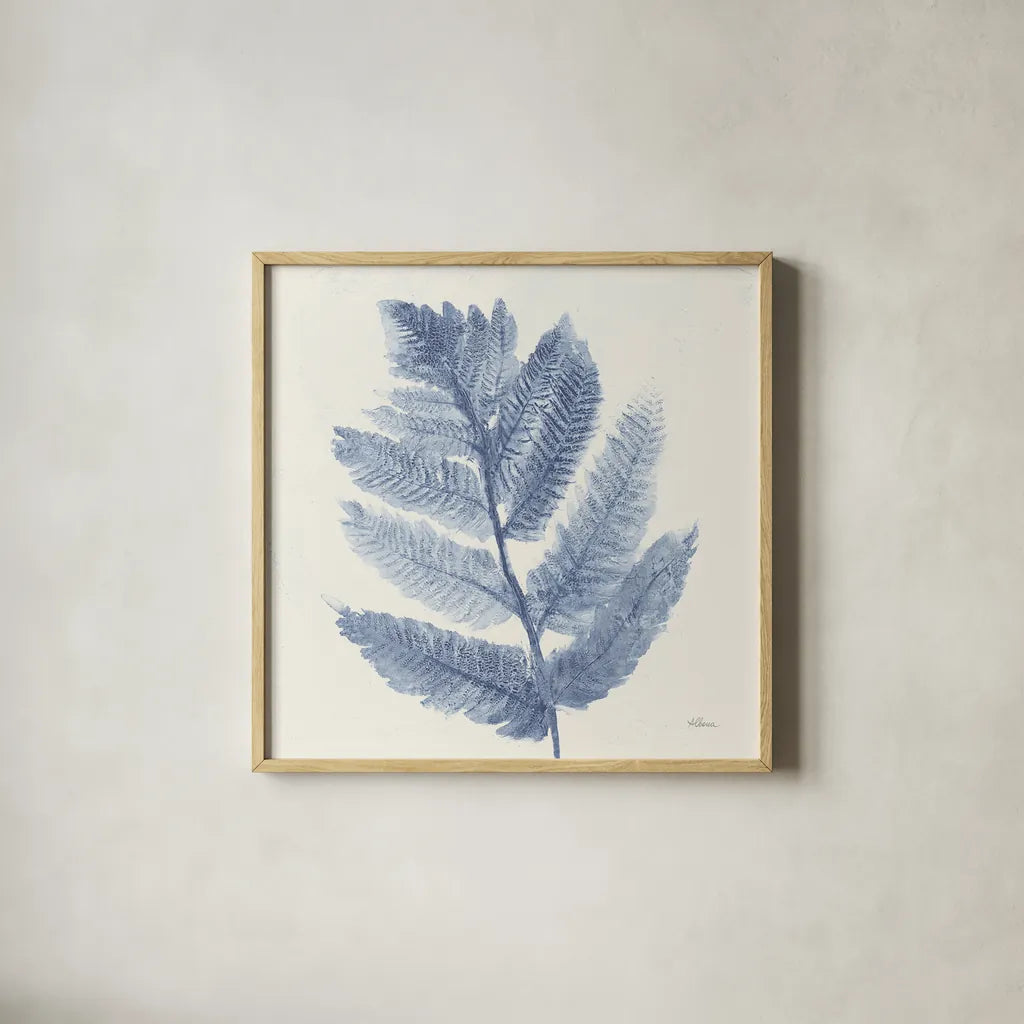 Forest Ferns I Blue by Albena Hristova. Shown in a natural wood glass frame for a timeless modern aesthetic. Available as an archival giclee rolled canvas, fine art paper, or poster print. SKU 42748a.