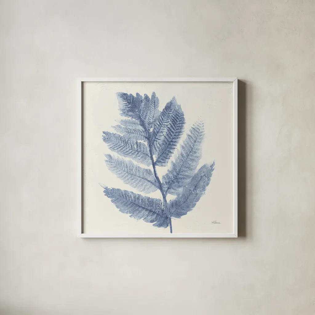 Forest Ferns I Blue by Albena Hristova. Shown in a crisp white glass frame for a clean and minimalist style. Available as an archival giclee rolled canvas, fine art paper, or poster print. SKU 42748a.