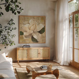 Gardenia Blossom on Script by Albena Hristova. Shown in a natural wood frame in a cozy modern living room. Available as an archival giclee rolled canvas, fine art paper, or poster print. SKU 22363a.
