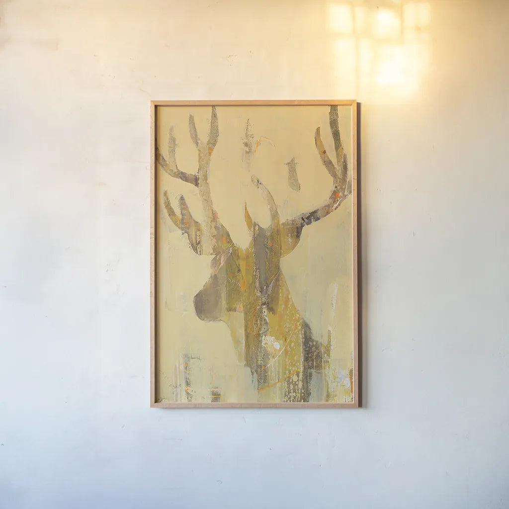 Golden Antlers II by Albena Hristova. shown as a paper print in a natural frame. Available as a archival giclee rolled canvas, fine art paper, or poster print. SKU 28366h.