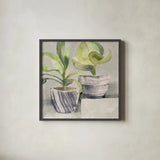 Greenery Still Life with Navy by Albena Hristova. Shown in a sleek black glass frame for a contemporary gallery look. Available as an archival giclee rolled canvas, fine art paper, or poster print. SKU 55337a.