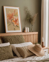Inspirational Lilies by Albena Hristova. shown as a paper print in a natural frame. Available as a archival giclee rolled canvas, fine art paper, or poster print. SKU 35683h.