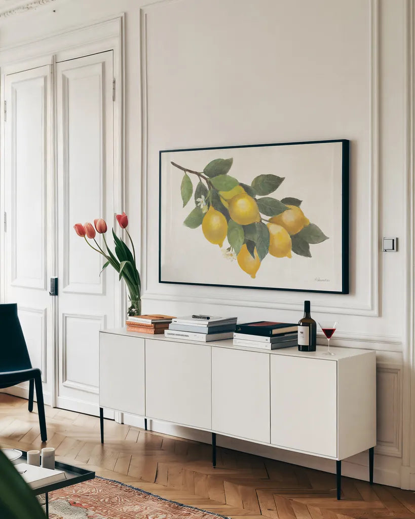 Lemon Branch I by Albena Hristova. shown as a framed stretched canvas in a living room above a console. Available as a archival giclee rolled canvas, fine art paper, or poster print. SKU 72451i.