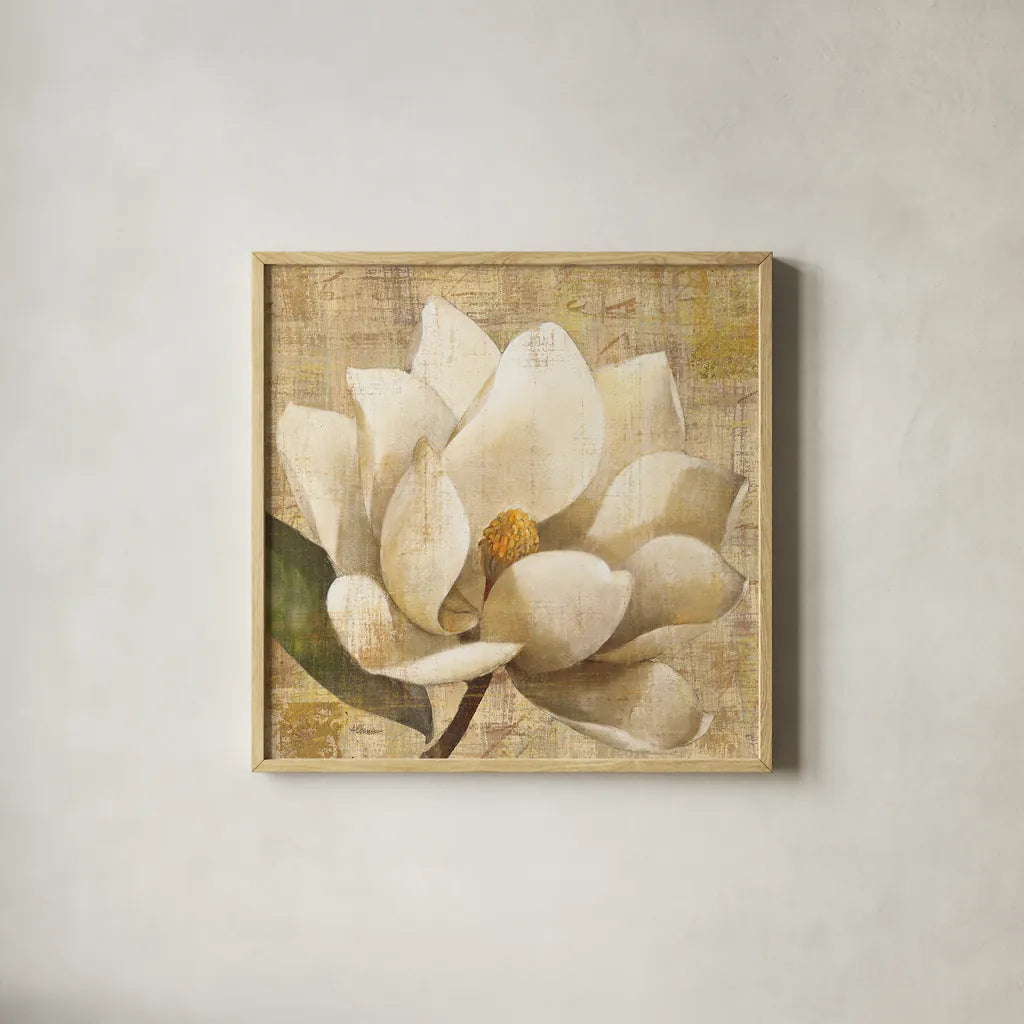 Magnolia Blossom on Script by Albena Hristova. Shown in a natural wood glass frame for a timeless modern aesthetic. Available as an archival giclee rolled canvas, fine art paper, or poster print. SKU 22364a.