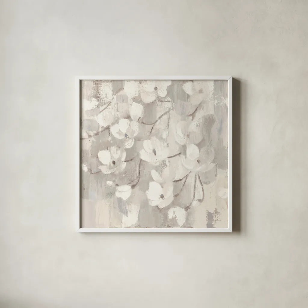 Magnolias in Spring I Neutral by Albena Hristova. Shown in a crisp white glass frame for a clean and minimalist style. Available as an archival giclee rolled canvas, fine art paper, or poster print. SKU 44774a.