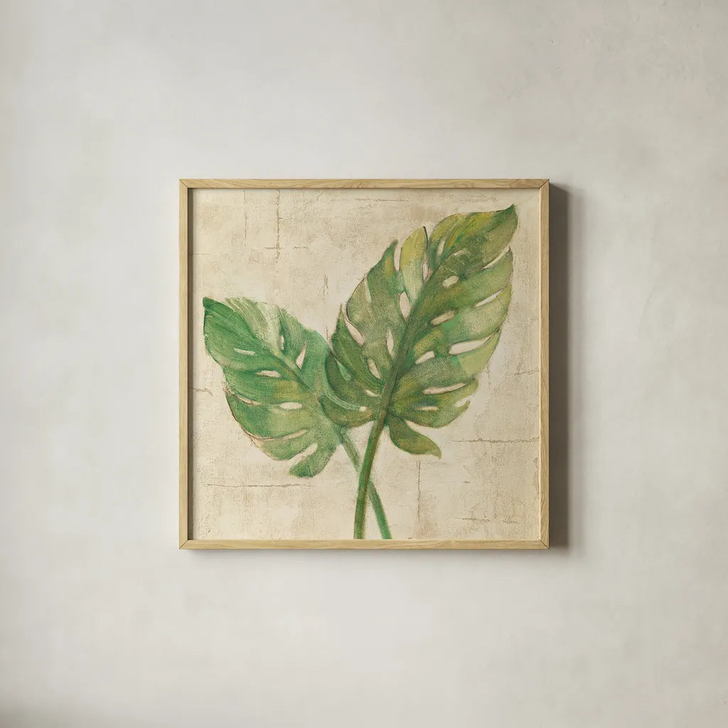 Monstera Leaves Neutral Crop by Albena Hristova. Shown in a natural wood glass frame for a timeless modern aesthetic. Available as an archival giclee rolled canvas, fine art paper, or poster print. SKU 24274a.