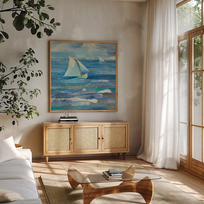 Ocean Sail v.2 Sq by Albena Hristova. Shown in a natural wood frame in a cozy modern living room. Available as an archival giclee rolled canvas, fine art paper, or poster print. SKU 20868a.