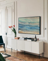 Ocean Waves by Albena Hristova. shown as a framed stretched canvas in a living room above a console. Available as a archival giclee rolled canvas, fine art paper, or poster print. SKU 30238i.