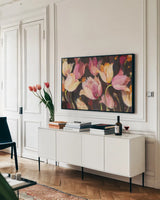 Popping Tulips by Albena Hristova. shown as a framed stretched canvas in a living room above a console. Available as a archival giclee rolled canvas, fine art paper, or poster print. SKU 32472i.