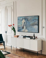 Poseidon Indigo Crop by Albena Hristova. shown as a framed stretched canvas in a living room above a console. Available as a archival giclee rolled canvas, fine art paper, or poster print. SKU 23850i.
