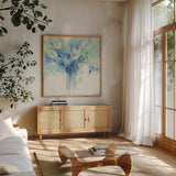 Pretty in Spring Blue by Albena Hristova. Shown in a natural wood frame in a cozy modern living room. Available as an archival giclee rolled canvas, fine art paper, or poster print. SKU 54518a.