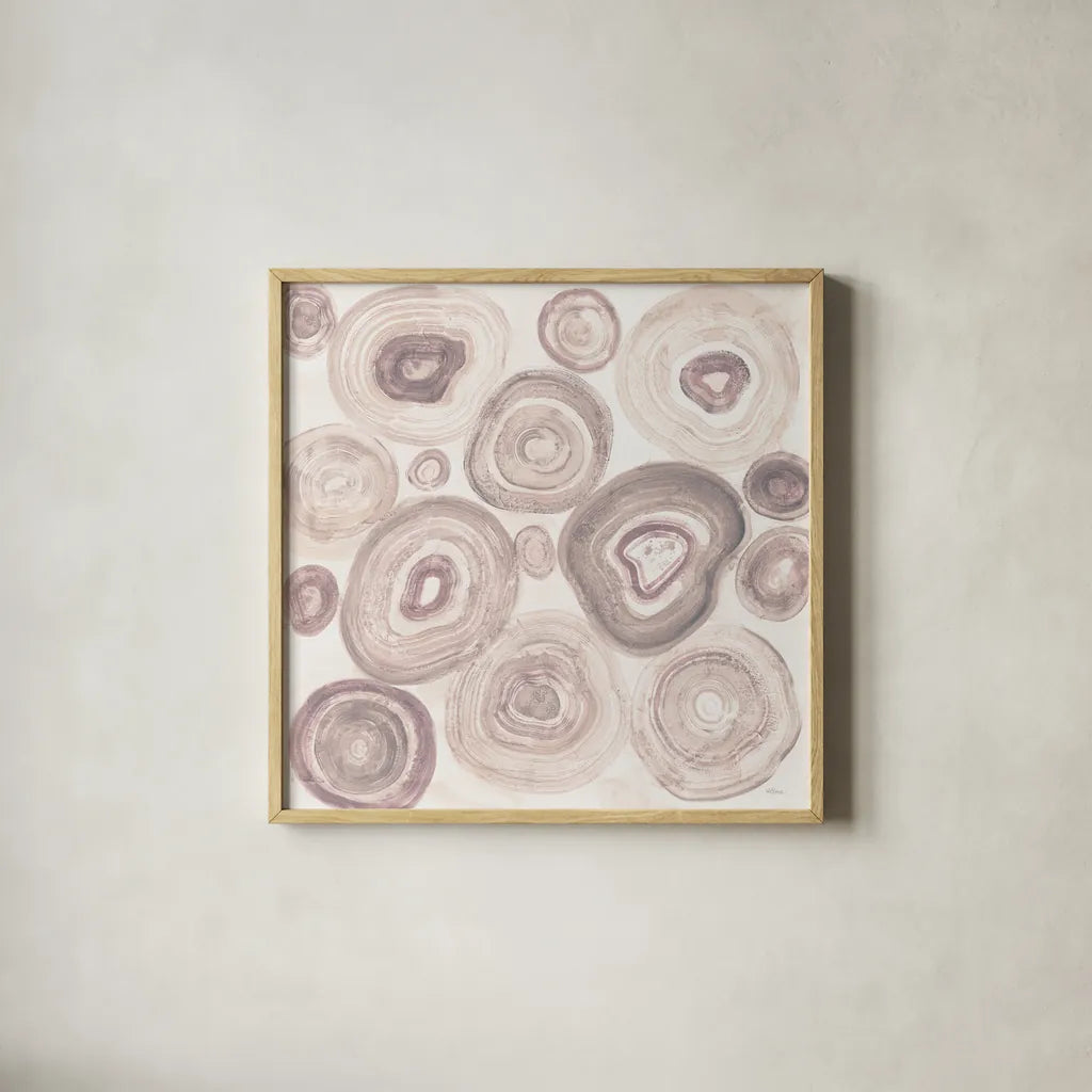 Rings of Power Blush by Albena Hristova. Shown in a natural wood glass frame for a timeless modern aesthetic. Available as an archival giclee rolled canvas, fine art paper, or poster print. SKU 82356a.