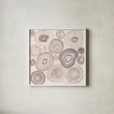 Rings of Power Blush by Albena Hristova. Shown in a crisp white glass frame for a clean and minimalist style. Available as an archival giclee rolled canvas, fine art paper, or poster print. SKU 82356a.
