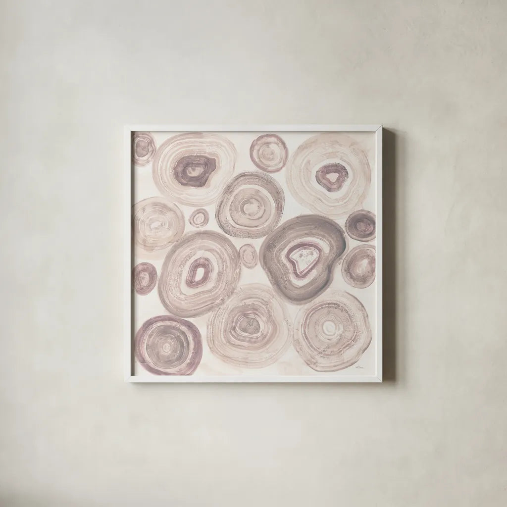 Rings of Power Blush by Albena Hristova. Shown in a crisp white glass frame for a clean and minimalist style. Available as an archival giclee rolled canvas, fine art paper, or poster print. SKU 82356a.