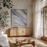 Silver Springs I Cool by Albena Hristova. Shown in a natural wood frame in a cozy modern living room. Available as an archival giclee rolled canvas, fine art paper, or poster print. SKU 56959a.