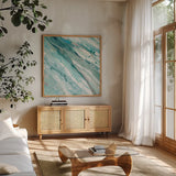 Silver Springs II Blue Green by Albena Hristova. Shown in a natural wood frame in a cozy modern living room. Available as an archival giclee rolled canvas, fine art paper, or poster print. SKU 44872a.