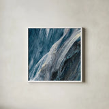 Splash Indigo by Albena Hristova. Shown in a crisp white glass frame for a clean and minimalist style. Available as an archival giclee rolled canvas, fine art paper, or poster print. SKU 26882a.