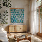 Stack of Tubes Blue by Albena Hristova. Shown in a natural wood frame in a cozy modern living room. Available as an archival giclee rolled canvas, fine art paper, or poster print. SKU 23396a.