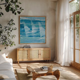 Summer Sail I Blue by Albena Hristova. Shown in a natural wood frame in a cozy modern living room. Available as an archival giclee rolled canvas, fine art paper, or poster print. SKU 47384a.