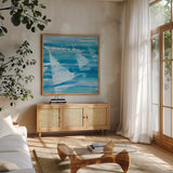 Summer Sail II Blue by Albena Hristova. Shown in a natural wood frame in a cozy modern living room. Available as an archival giclee rolled canvas, fine art paper, or poster print. SKU 47385a.