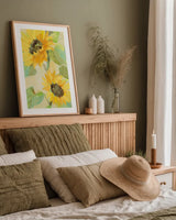 Sunny Blooms by Albena Hristova. shown as a paper print in a natural frame. Available as a archival giclee rolled canvas, fine art paper, or poster print. SKU 54068h.