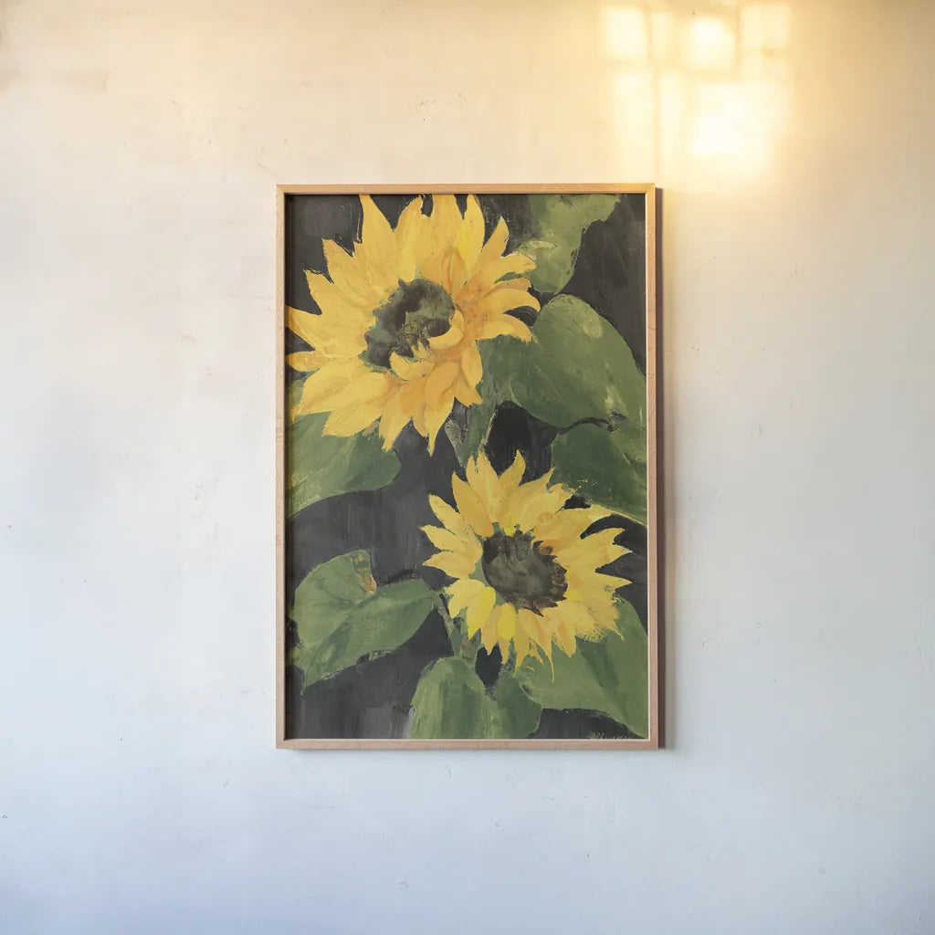 Sunny Blooms on Black by Albena Hristova. shown as a paper print in a natural frame. Available as a archival giclee rolled canvas, fine art paper, or poster print. SKU 80825h.
