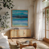 Tidal Dreams II by Albena Hristova. Shown in a natural wood frame in a cozy modern living room. Available as an archival giclee rolled canvas, fine art paper, or poster print. SKU 93881a.
