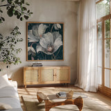 Transluncent Poppies Navy by Albena Hristova. Shown in a natural wood frame in a cozy modern living room. Available as an archival giclee rolled canvas, fine art paper, or poster print. SKU 36011a.